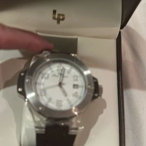 Lucion  Piccard Swiss men’s watch. Chocolate brown band. Can dress up or down